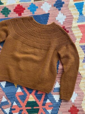 PetiteKnit Anker’s Sweater – My Size is knitted in Sunday by Sandnes Garn in the color 2345. The color is discontinued and the closest match in our selection is the color 2543 brown sugar. PetiteKnit Anker's Sweater - My Size is knitted in Sunday by Sandnes Garn in the color 2345. The color is discontinued and the closest match in our selection is the color 2543 brown sugar.