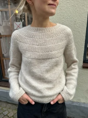 PetiteKnit Anker's Sweater - My Size is knitted in Tynn Peer Gynt by Sandnes Garn in the color 2641 held together with Tynn Silk Mohair by Sandnes Garn in the color 1012.