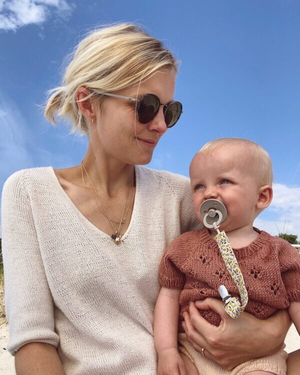 PetiteKnit Cumulus Tee is knitted in in Pure Silk by Knitting for Olive in the color Cream. PetiteKnit Cumulus Tee is knitted in in Pure Silk by Knitting for Olive in the color Cream.