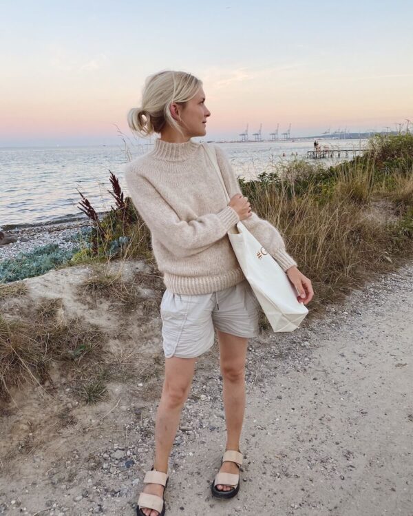 PetiteKnit Novice Sweater is knitted in Jensen by Isager in color 0 held together with Silk Mohair by Isager in color 6. Closest match in our selection is Sandnes Garn Kos in color 2611.