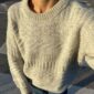 PetiteKnit Storm Sweater is knitted in Peer Gynt by Sandnes Garn in the color Ash melange [1021].