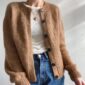 The brown Novice Cardigan - Chunky Edition is knitted in Kos by Sandnes Garn in the color Brunt sukker [2543] held together with Tynn Silk Mohair by Sandnes Garn in the color Brunt sukker [2543]. The colors are discontinued.