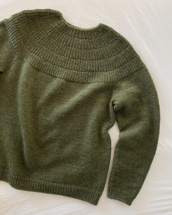 PetiteKnit Anker’s Sweater My Boyfriend's Size is knitted in Peer Gynt in the color Dark Green Heather 9572 from Sandnes Garn. PetiteKnit Anker’s Sweater My Boyfriend's Size is knitted in Peer Gynt in the color Dark Green Heather 9572 from Sandnes Garn.