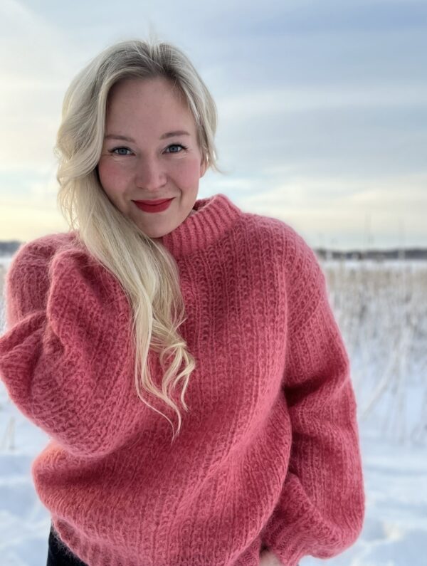 Magnolia by PoolaKnits is knitted in yarns that is not available in our store. The closest match in our selection is Sandnes Garn Alpakka Ull in color 4227 Equestrian Red.
