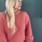 Magnolia by PoolaKnits is knitted in yarns that is not available in our store. The closest match in our selection is Sandnes Garn Alpakka Ull in color 4227 Equestrian Red.