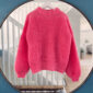 Magnolia by PoolaKnits is knitted in yarns that is not available in our store. The closest match in our selection is Sandnes Garn Alpakka Ull in color 4227 Equestrian Red.