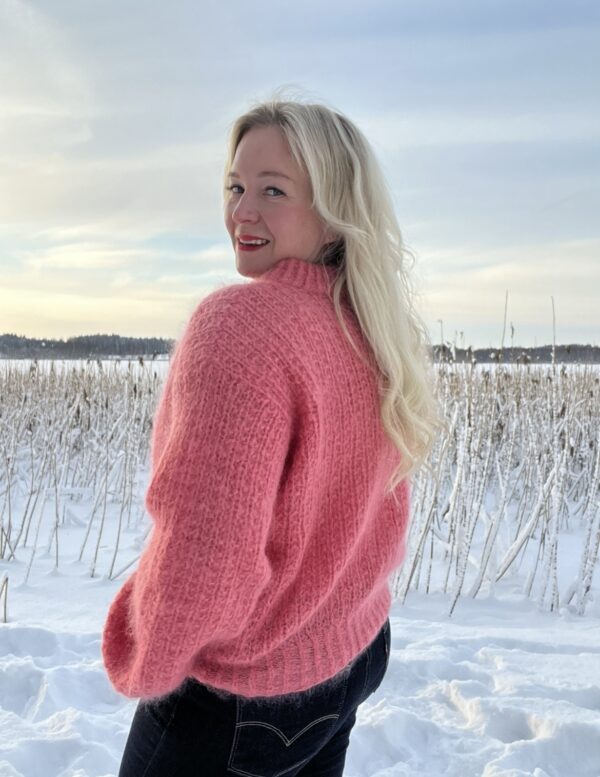Magnolia by PoolaKnits is knitted in yarns that is not available in our store. The closest match in our selection is Sandnes Garn Alpakka Ull in color 4227 Equestrian Red.