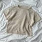 Het witte Cloud T-shirt is gebreid van Compatible Cashmere van Knitting for Olive in de kleur Cream.