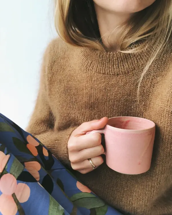 The light brown Stockholm Sweater is knitted in Silk Mohair by Isager in color 63. The light brown Stockholm Sweater is knitted in Silk Mohair by Isager in color 63.