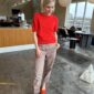The red Poppy Tee is knitted in Cashmere Classic by Cardiff in the color Hermes [517].