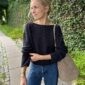 The black Sevilla Blouse is knitted in Line by Sandnes Garn in color Black [1099] held together with Tynn Line by Sandnes Garn in color Black [1099].