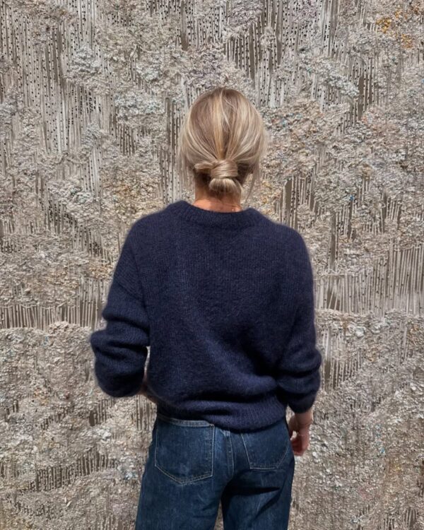 The blue Stockholm Sweater is knitted in Silk Mohair by Isager in color 100. The blue Stockholm Sweater is knitted in Silk Mohair by Isager in color 100.