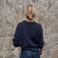 The blue Stockholm Sweater is knitted in Silk Mohair by Isager in color 100.