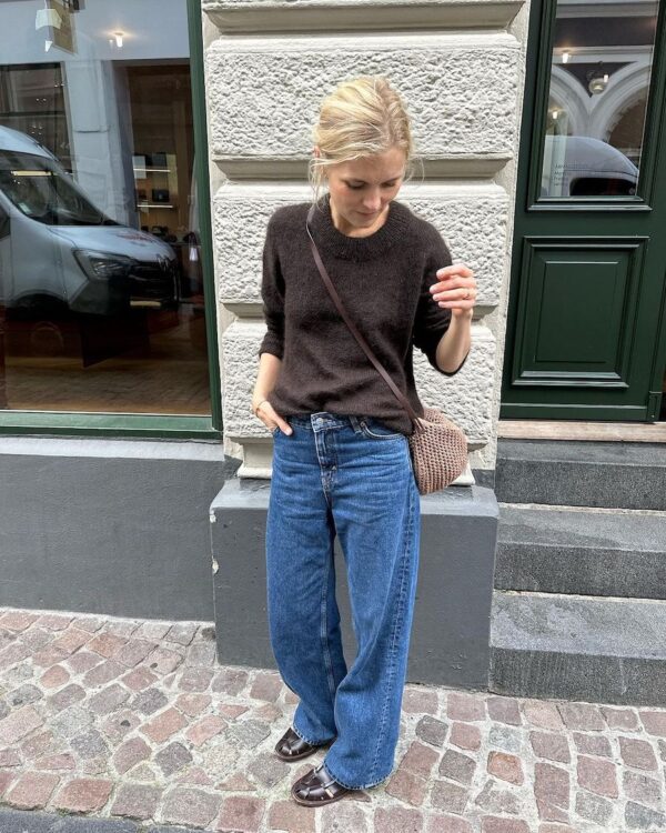 The dark brown Stockholm Sweater is knitted in Silk Mohair by Isager in color 34. The dark brown Stockholm Sweater is knitted in Silk Mohair by Isager in color 34.