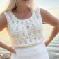 The white Tiny Dancer Top is knitted with Knitting for Olive Pure Silk in color Cream (two strands of yarn held together)