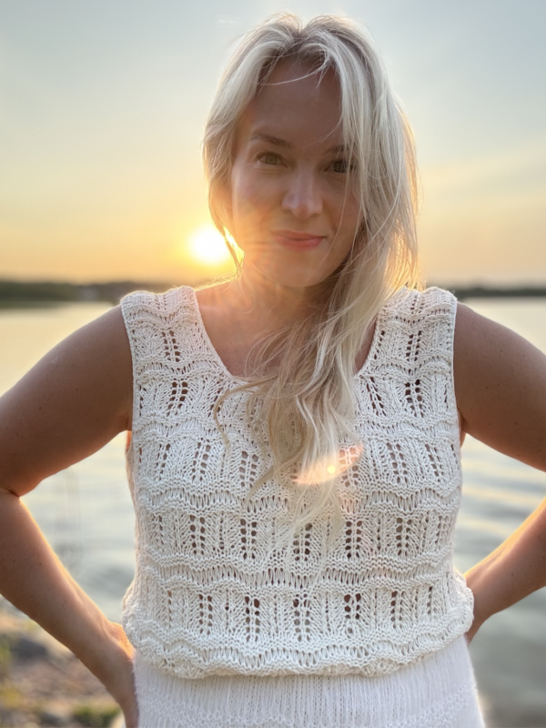 The white Tiny Dancer Top is knitted with Knitting for Olive Pure Silk in color Cream (two strands of yarn held together) The white Tiny Dancer Top is knitted with Knitting for Olive Pure Silk in color Cream (two strands of yarn held together)
