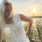 The white Tiny Dancer Top is knitted with Knitting for Olive Pure Silk in color Cream (two strands of yarn held together)