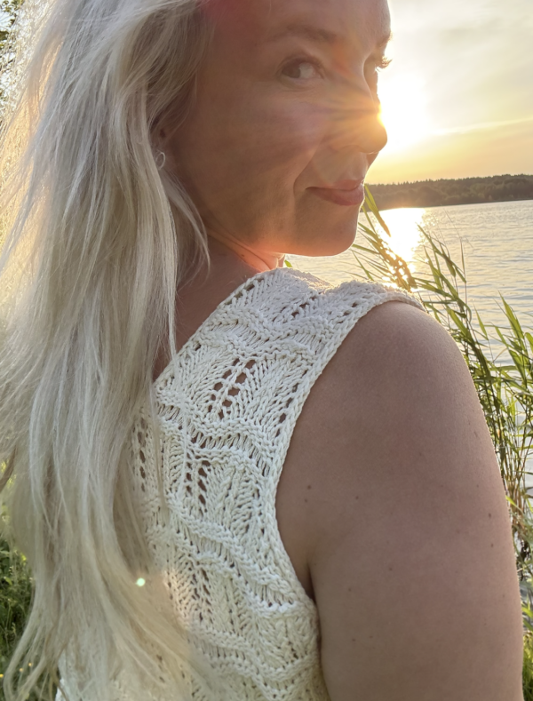 The white Tiny Dancer Top is knitted with Knitting for Olive Pure Silk in color Cream (two strands of yarn held together) The white Tiny Dancer Top is knitted with Knitting for Olive Pure Silk in color Cream (two strands of yarn held together)