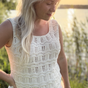 The white Tiny Dancer Top is knitted with Knitting for Olive Pure Silk in color Cream (two strands of yarn held together)